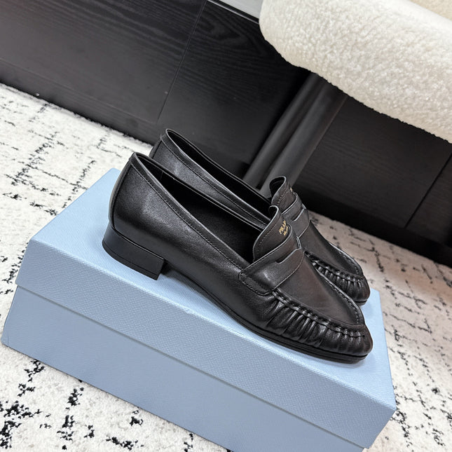 PRADA 26S LOAFERS 25MM IN BLACK CALFSKIN