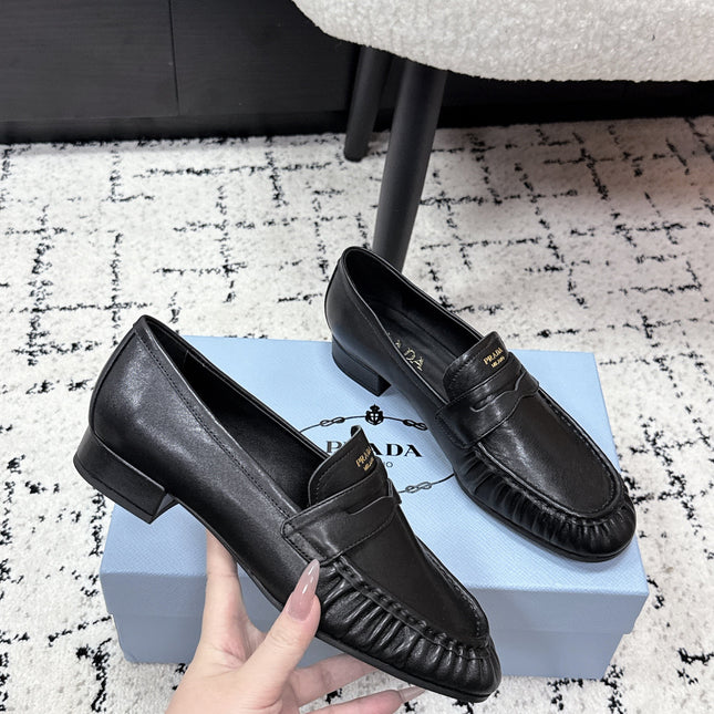 PRADA 26S LOAFERS 25MM IN BLACK CALFSKIN