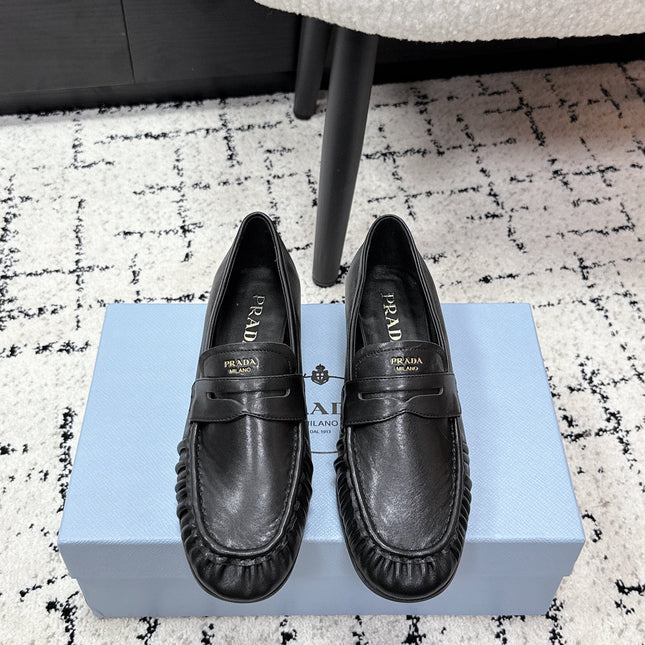 PRADA 26S LOAFERS 25MM IN BLACK CALFSKIN
