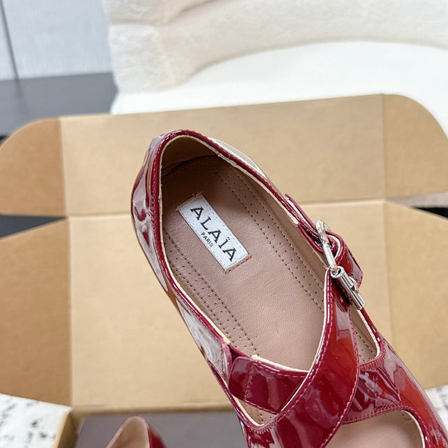 ALAIA 26S CROSS-STRAP BALLET FLATS IN RED GLOSSY LAMBSKIN
