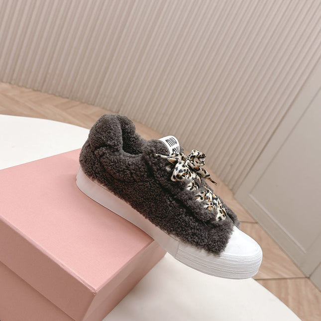 MIUMIU 25S SNEAKERS IN DARK BROWN SHEARLING WITH LEOPARD-PRINT LACES