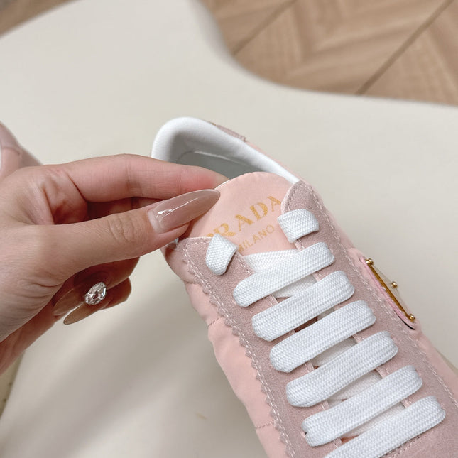 PRADA 26S PLATFORM SNEAKERS 50MM IN BLUSH PINK NYLON AND SUEDE