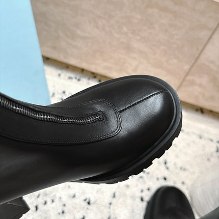 PRADA 26S FRONT ZIP CHUNKY HEEL ANKLE BOOTS 70MM IN BLACK CALFSKIN