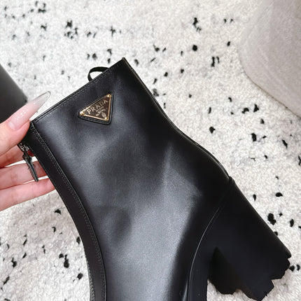PRADA 26S FRONT ZIP CHUNKY HEEL ANKLE BOOTS 70MM IN BLACK CALFSKIN