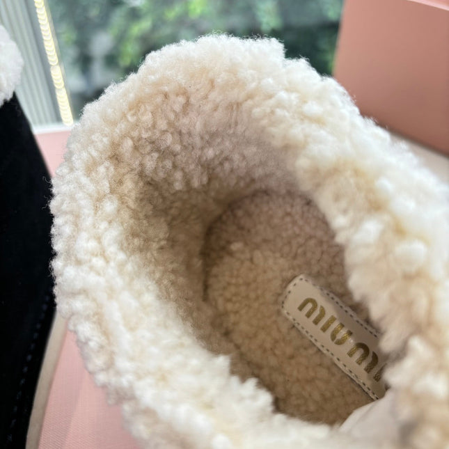MIUMIU 26S ANKLE BOOTS IN BLACK SUEDE AND SHEARLING