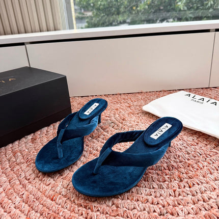 ALAIA 26S HEELED THONG SANDALS IN DARK BLUE VELVET