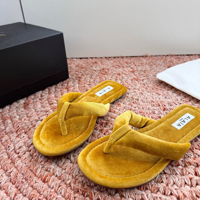 ALAIA 26S THONG SANDALS IN MUSTARD YELLOW VELVET