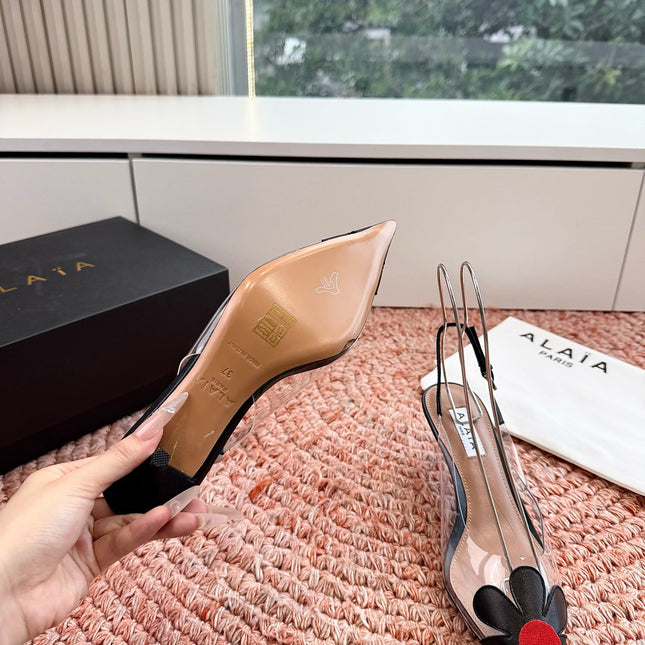 ALAIA 26S POINTED-TOE SLINGBACK HEELS IN BLACK LAMBSKIN AND TRANSPARENT PVC