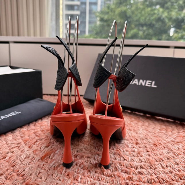 CHANEL 26S POINTED TOE HIGH HEEL SLINGBACKS IN ORANGE LAMBSKIN WITH BLACK FLORAL APPLIQUE