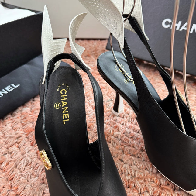 CHANEL 26S POINTED TOE HIGH HEEL SLINGBACKS IN BLACK AND WHITE LAMBSKIN WITH FLORAL APPLIQUE