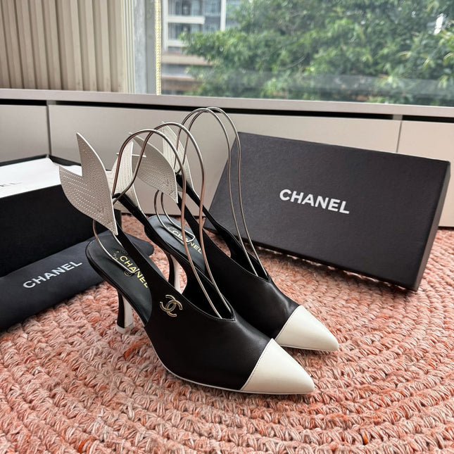CHANEL 26S POINTED TOE HIGH HEEL SLINGBACKS IN BLACK AND WHITE LAMBSKIN WITH FLORAL APPLIQUE