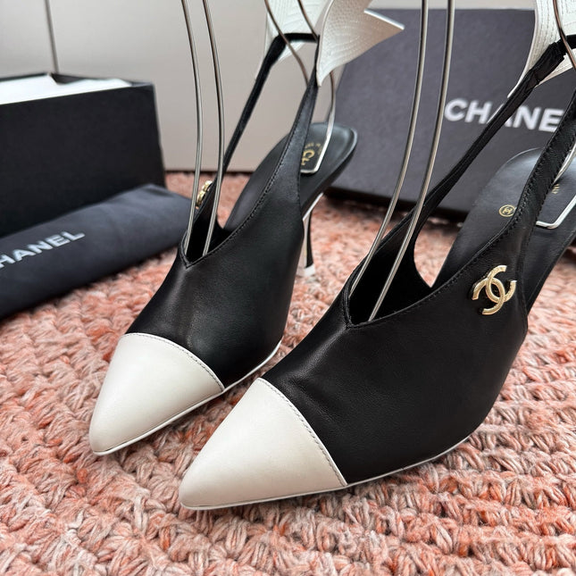 CHANEL 26S POINTED TOE HIGH HEEL SLINGBACKS IN BLACK AND WHITE LAMBSKIN WITH FLORAL APPLIQUE