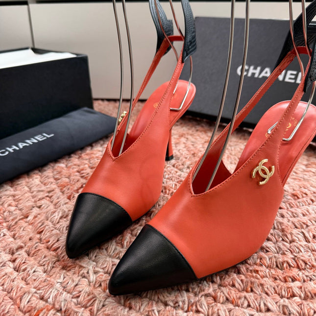 CHANEL 26S POINTED TOE HIGH HEEL SLINGBACKS IN ORANGE LAMBSKIN WITH BLACK FLORAL APPLIQUE