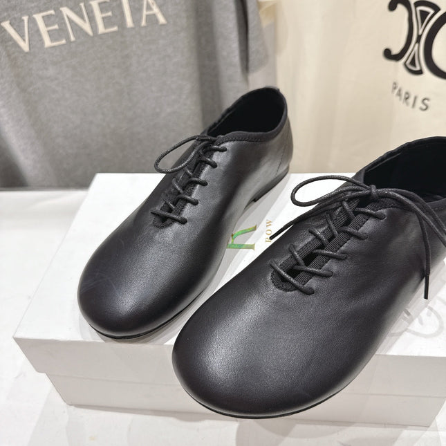 THE ROW 26S MINIMAL LACE-UP SHOES IN BLACK CALFSKIN