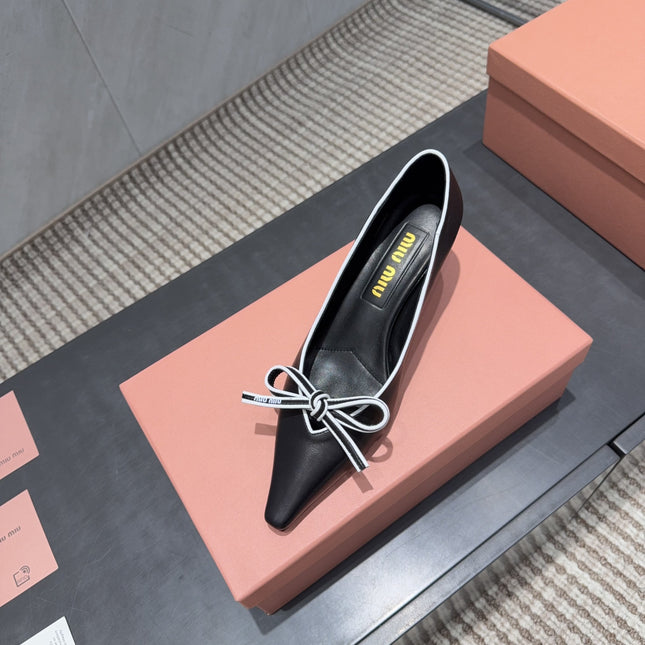 MIUMIU 26S POINTED TOE PUMPS 55MM IN BLACK AND WHITE CALFSKIN WITH BOW