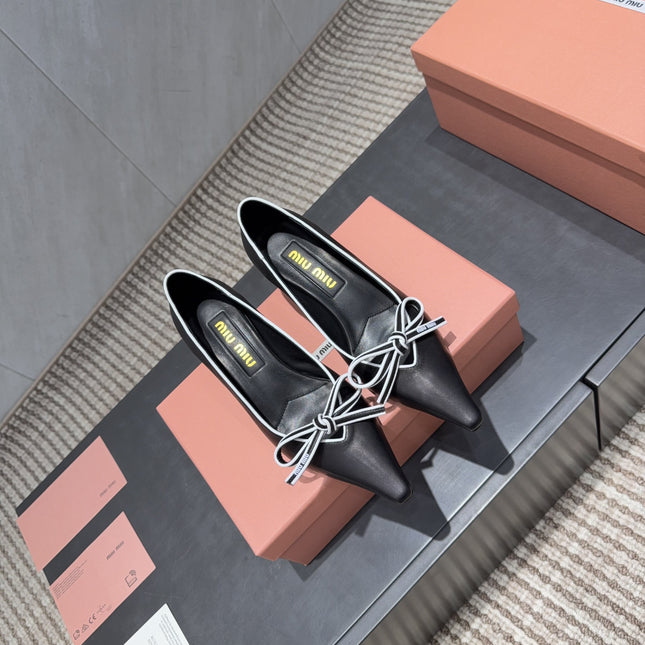 MIUMIU 26S POINTED TOE PUMPS 55MM IN BLACK AND WHITE CALFSKIN WITH BOW
