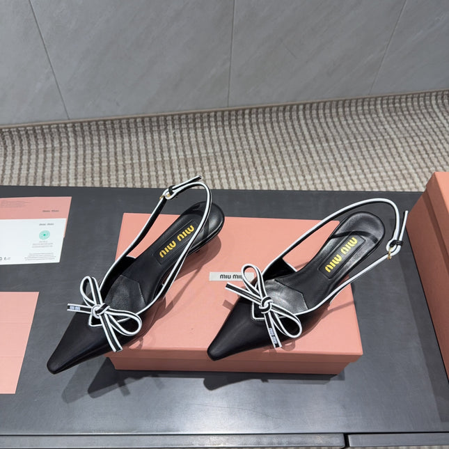 MIUMIU 26S SLINGBACK 55MM IN BLACK AND WHITE CALFSKIN WITH BOW
