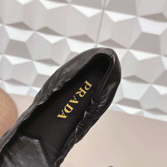 PRADA 26S ROUND TOE FLATS WITH BOW IN BLACK CALFSKIN