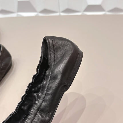 PRADA 26S ROUND TOE FLATS WITH BOW IN BLACK CALFSKIN