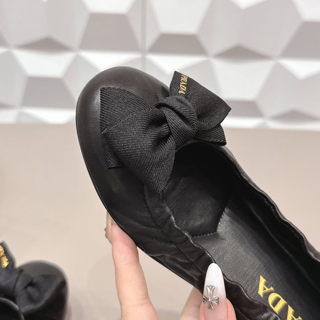 PRADA 26S ROUND TOE FLATS WITH BOW IN BLACK CALFSKIN