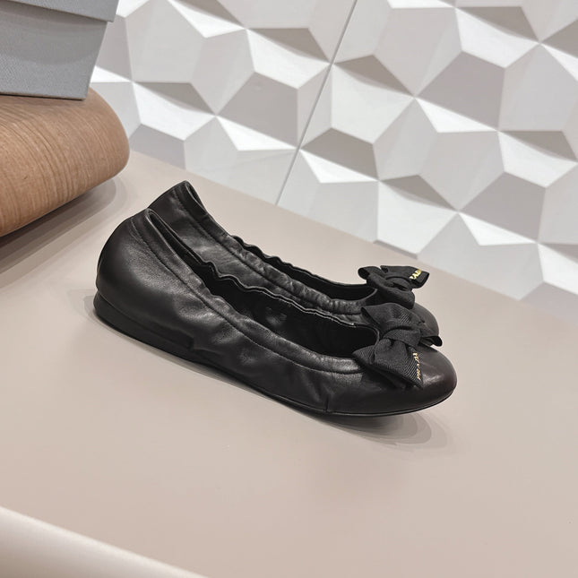 PRADA 26S ROUND TOE FLATS WITH BOW IN BLACK CALFSKIN