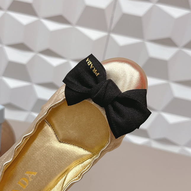 PRADA 26S ROUND TOE FLATS WITH BOW IN GOLD CALFSKIN