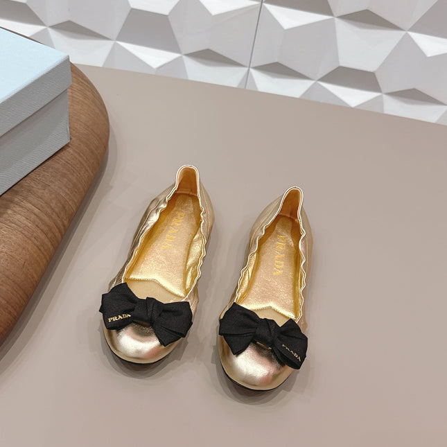 PRADA 26S ROUND TOE FLATS WITH BOW IN GOLD CALFSKIN