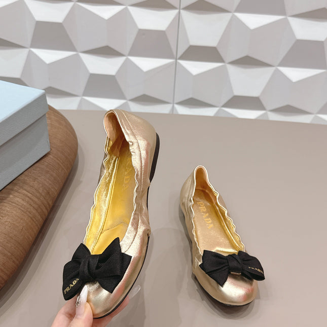 PRADA 26S ROUND TOE FLATS WITH BOW IN GOLD CALFSKIN