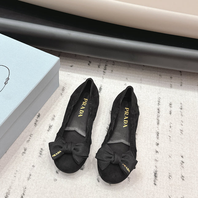 PRADA 26S ROUND TOE FLATS WITH BOW IN BLACK SUEDE