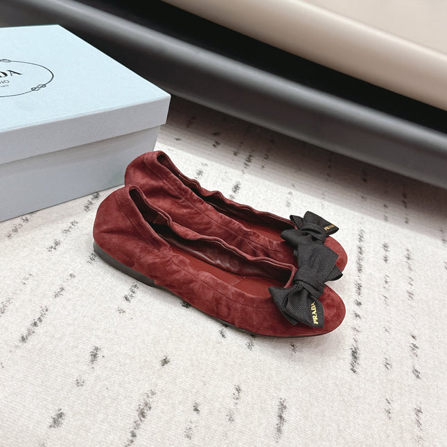 PRADA 26S ROUND TOE FLATS WITH BOW IN DARK RED SUEDE