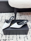 ALAIA 26S HEELED MULES 65 MM IN WHITE GLOSSY CALFSKIN