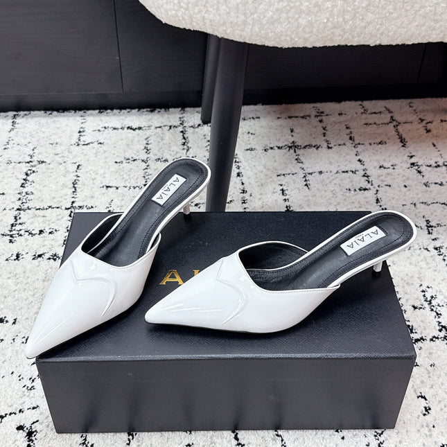 ALAIA 26S HEELED MULES 65 MM IN WHITE GLOSSY CALFSKIN
