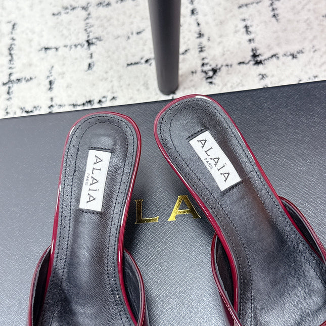 ALAIA 26S HEELED MULES 65 MM IN DARK RED GLOSSY CALFSKIN
