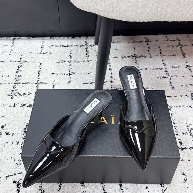 ALAIA 26S HEELED MULES 65 MM IN BLACK GLOSSY CALFSKIN