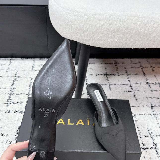 ALAIA 26S HEELED MULES 65 MM IN BLACK SATIN