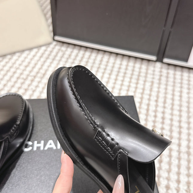 CHANEL 26S LOAFER MULES IN BLACK CALFSKIN