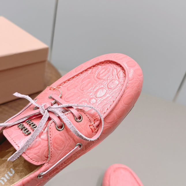 MIUMIU 26S BOAT SHOES IN PINK EMBOSSED CALFSKIN
