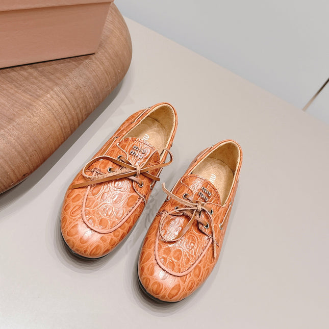 MIUMIU 26S BOAT SHOES IN ORANGE BROWN EMBOSSED CALFSKIN