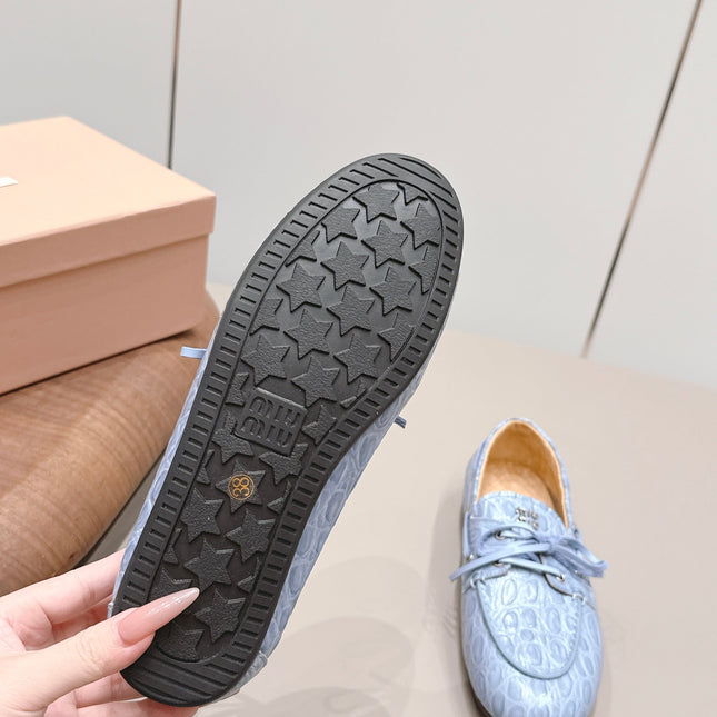 MIUMIU 26S BOAT SHOES IN BLUE EMBOSSED CALFSKIN