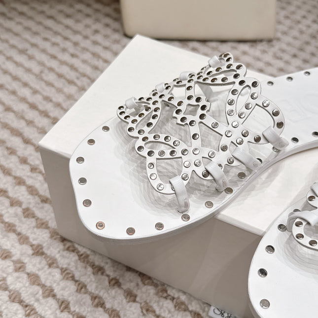 LOEWE 26S PETAL ANAGRAM SLIDE IN WHITE CALFSKIN WITH STUDS