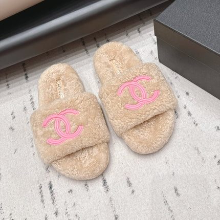 CHANEL 26S SLIDE MULES IN BEIGE SHEARLING AND PINK CC LOGO
