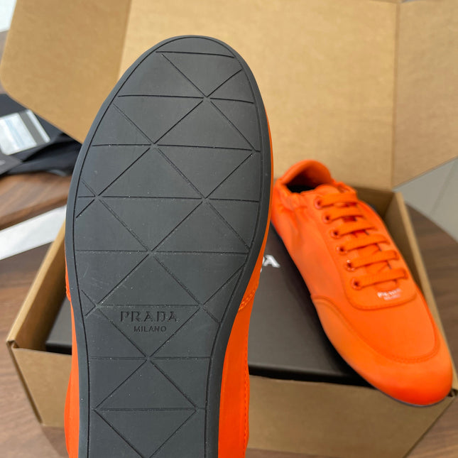 PRADA 25S SNEAKER IN ORANGE SILK