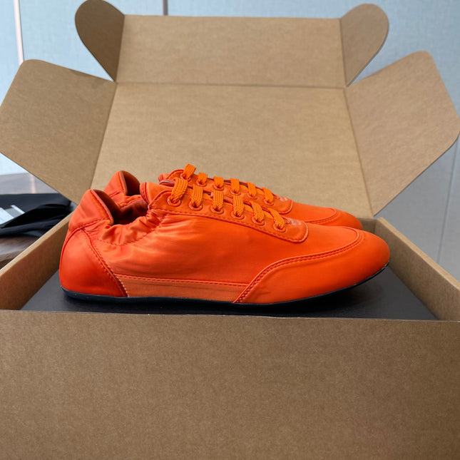 PRADA 25S SNEAKER IN ORANGE SILK