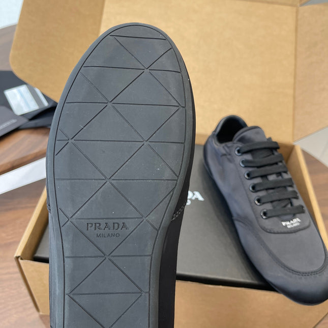 PRADA 25S SNEAKER IN BLACK SILK