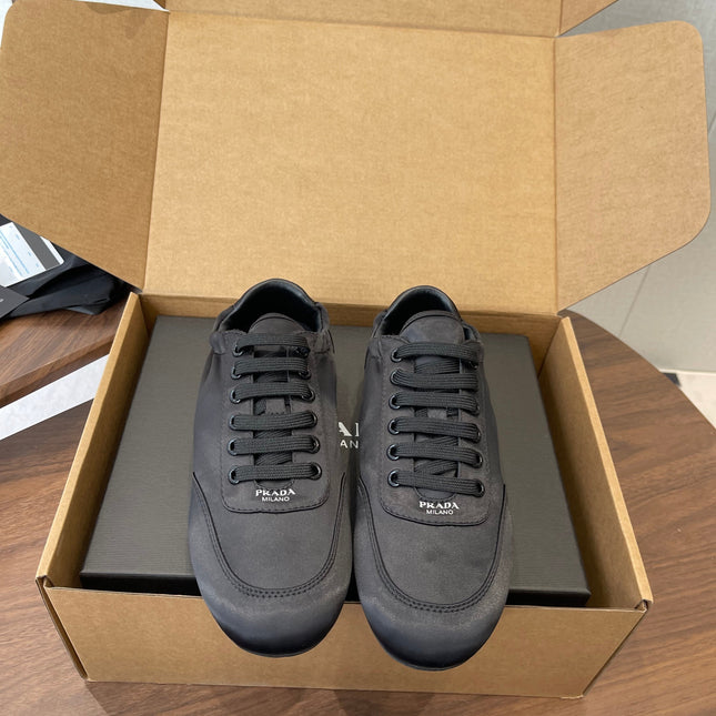 PRADA 25S SNEAKER IN BLACK SILK