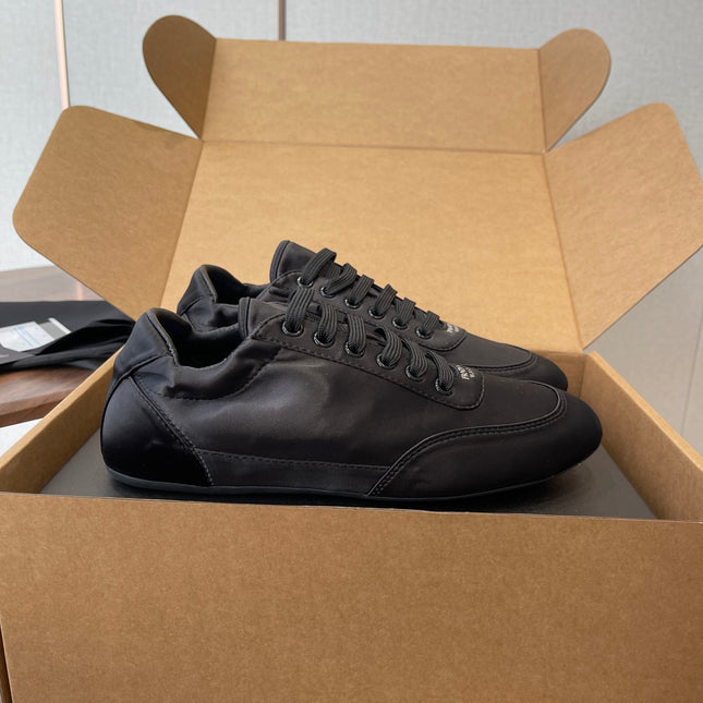 PRADA 25S SNEAKER IN BLACK SILK