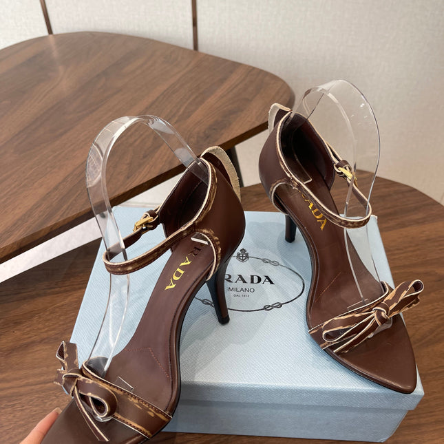 PRADA 26S HIGH HEEL SANDALS 85MM IN CHOCOLATE BROWN CALFSKIN WITH BOW