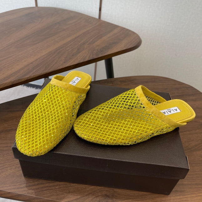 ALAIA 26S FLAT MULES IN DARK YELLOW SUEDE AND MESH RHINESTONE-EMBELLISHED