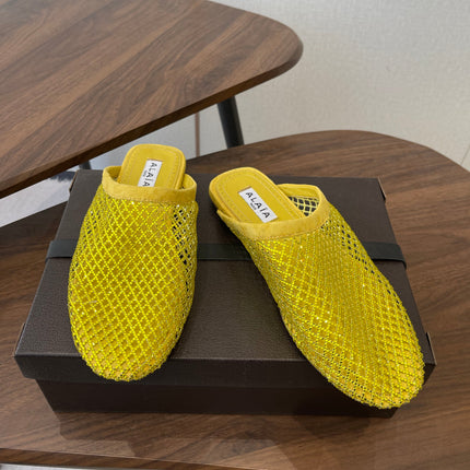 ALAIA 26S FLAT MULES IN DARK YELLOW SUEDE AND MESH RHINESTONE-EMBELLISHED