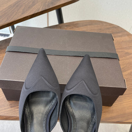 ALAIA 26S HEELED MULES 50 MM IN BLACK FABRIC